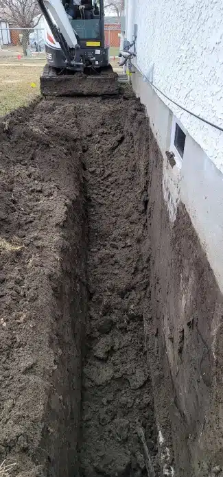 Trecnhing Around Foundation Basment Repair Regina